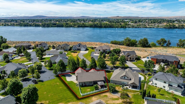 19 Ivy Ln, Pasco, WA 99301 - aerial view of residential area featuring property parcel outlined and a water and mountain view