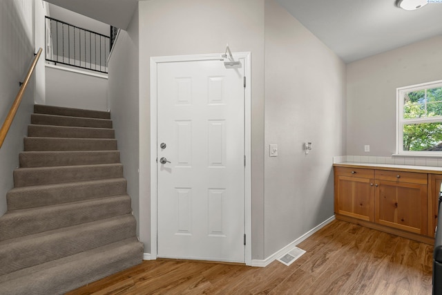 19 Ivy Ln, Pasco, WA 99301 - entrance foyer featuring light wood-type flooring, stairs, and vaulted ceiling