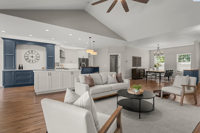 19 Ivy Ln, Pasco, WA 99301 - living area with ceiling fan, wood finished floors, recessed lighting, a chandelier, and high vaulted ceiling