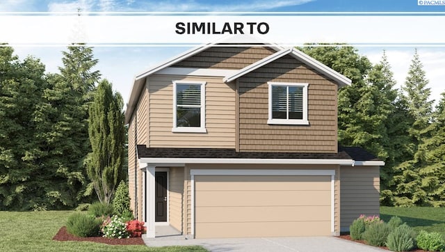 611 S Zeelar St, Kennewick, WA 99336 - view of front of property with an attached garage, concrete driveway, and a front yard