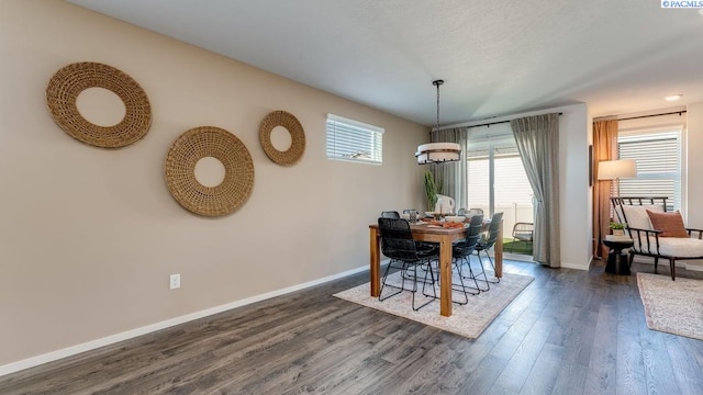 611 S Zeelar St, Kennewick, WA 99336 - dining space with dark wood-style flooring and baseboards