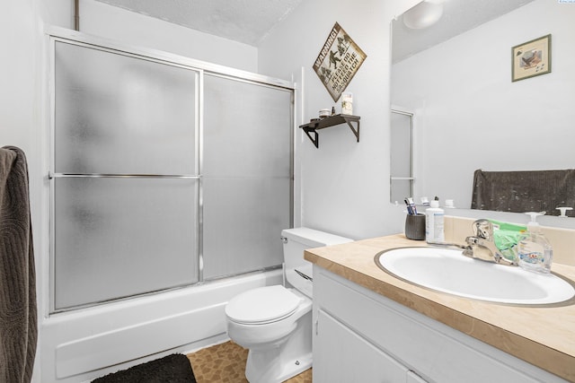 1430 NW Deane St, Pullman, WA 99163 - full bath with vanity, toilet, bath / shower combo with glass door, and a textured ceiling