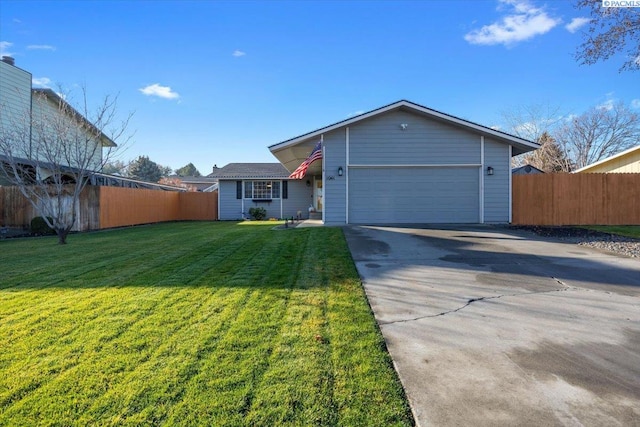 view of front facade featuring a garage and a front yard