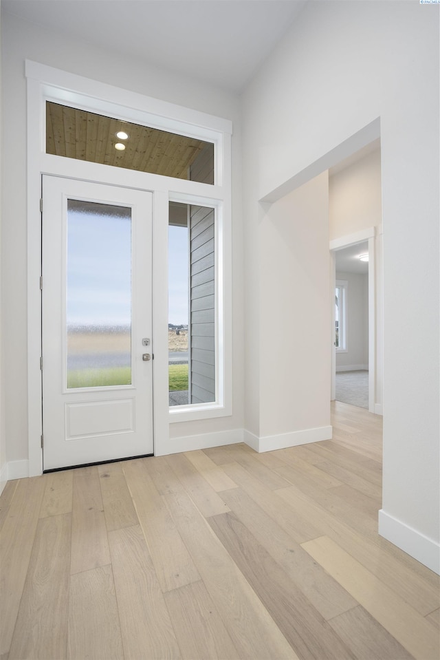 entrance foyer featuring light hardwood / wood-style floors