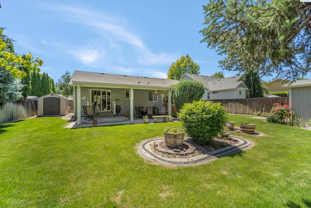 704 W 18th Ct, Kennewick, WA 99337 - rear view of house with a patio area