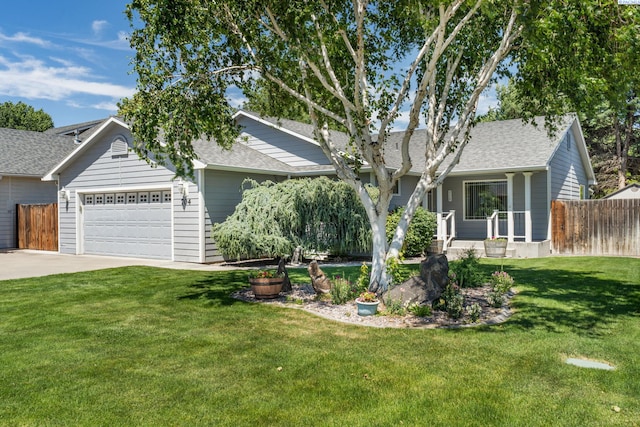 704 W 18th Ct, Kennewick, WA 99337 - ranch-style home with a garage, a shingled roof, and concrete driveway