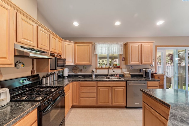 704 W 18th Ct, Kennewick, WA 99337 - kitchen featuring appliances with stainless steel finishes, under cabinet range hood, light brown cabinets, a sink, and healthy amount of natural light