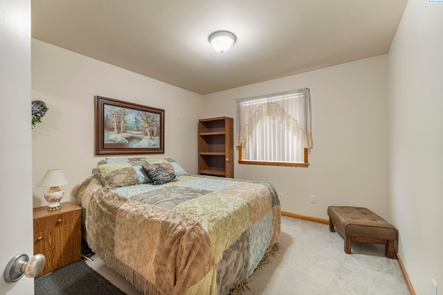 704 W 18th Ct, Kennewick, WA 99337 - bedroom featuring light colored carpet and baseboards