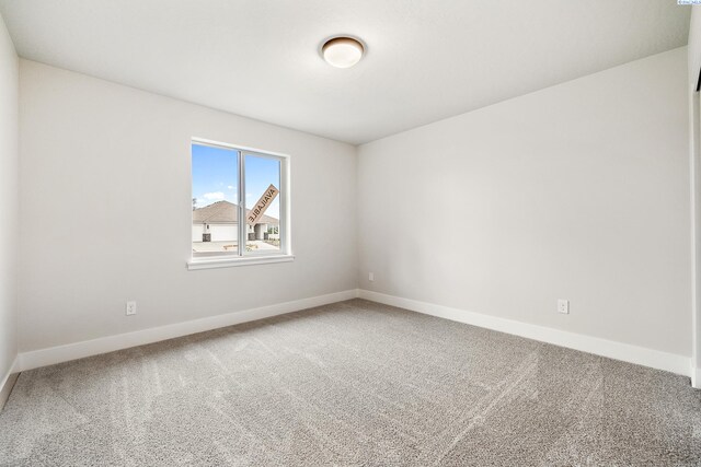 10709 Kokanee Dr, Pasco, WA 99301 - carpeted spare room featuring baseboards