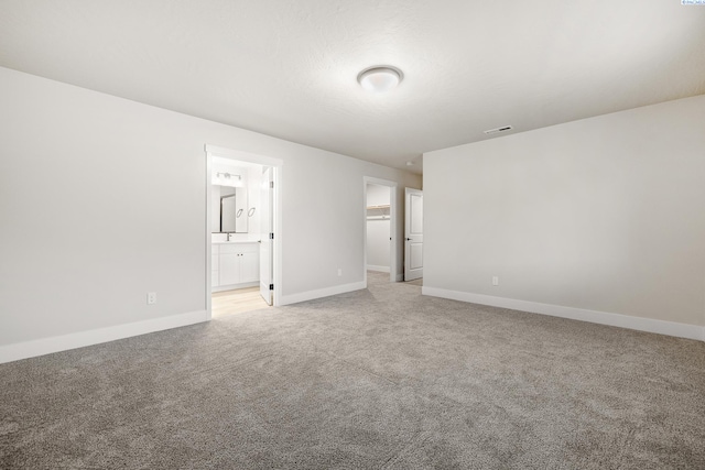 10709 Kokanee Dr, Pasco, WA 99301 - empty room featuring light carpet and baseboards