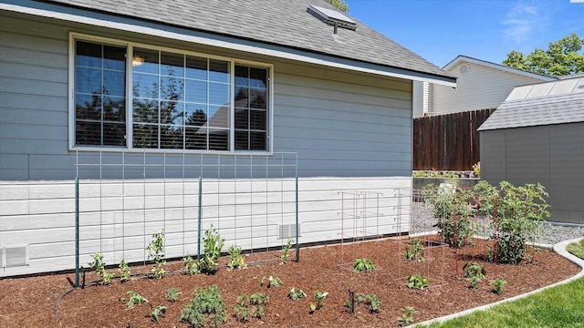 4318 Desert Pl, Pasco, WA 99301 - view of property exterior with a garden and a storage shed