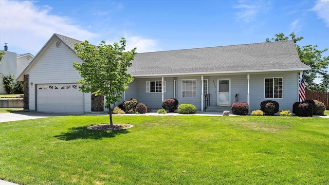 4318 Desert Pl, Pasco, WA 99301 - view of front of home with driveway, an attached garage, covered porch, and roof with shingles