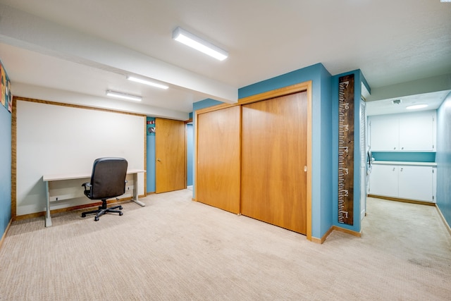 home office featuring carpet floors and baseboards