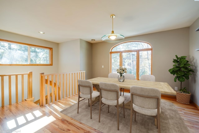 dining area featuring light wood-style floors, a wealth of natural light, and recessed lighting