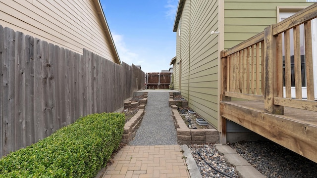 view of property exterior with fence