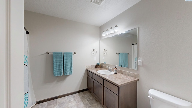 1025 SW Corral Ct, Pullman, WA 99163 - full bathroom with vanity, a textured ceiling, and a shower with curtain
