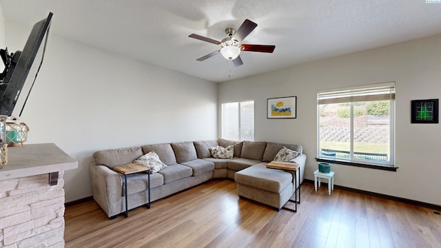 1025 SW Corral Ct, Pullman, WA 99163 - living room featuring light wood-style floors and a ceiling fan