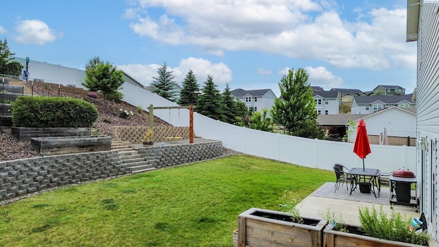 1025 SW Corral Ct, Pullman, WA 99163 - fenced backyard featuring a patio area and a residential view
