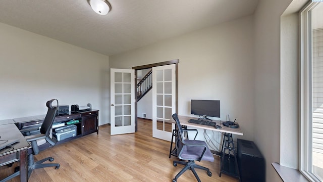 1025 SW Corral Ct, Pullman, WA 99163 - office featuring french doors and light wood-style flooring