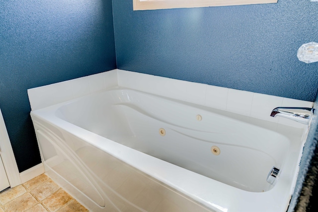 4210 Cornish Ln, Pasco, WA 99301 - full bathroom with tile patterned flooring, a textured wall, and a tub with jets