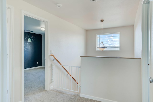 4210 Cornish Ln, Pasco, WA 99301 - hallway featuring baseboards, an upstairs landing, and carpet flooring