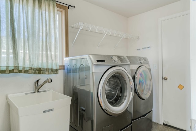 4210 Cornish Ln, Pasco, WA 99301 - clothes washing area featuring washer and clothes dryer, laundry area, and a sink
