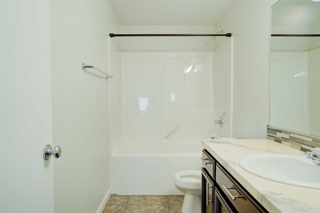 4210 Cornish Ln, Pasco, WA 99301 - bathroom featuring vanity, decorative backsplash, bathtub / shower combination, tile patterned flooring, and toilet