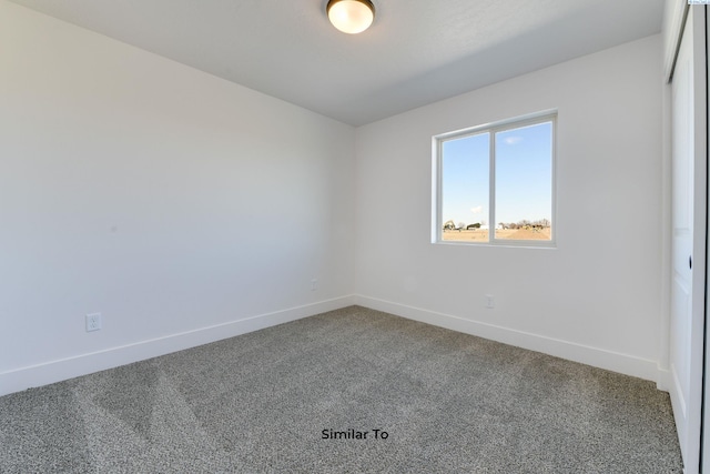 1610 Diamond Ave, Grandview, WA 98930 - carpeted empty room featuring baseboards