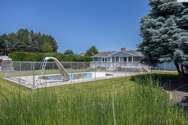 10012 Maple Dr, Pasco, WA 99301 - view of swimming pool with a water slide and a wooden deck