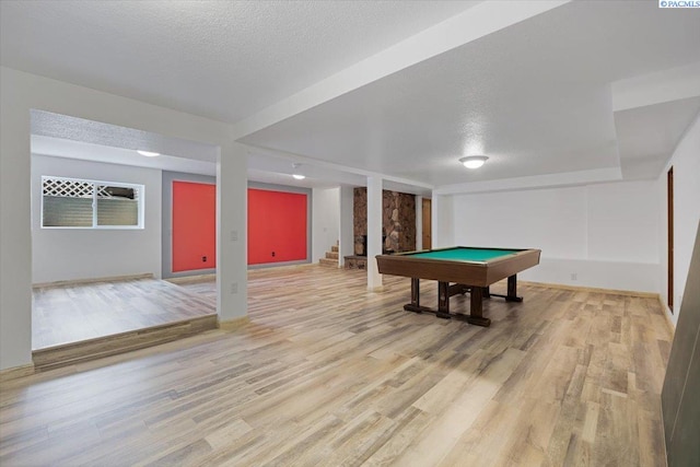 10012 Maple Dr, Pasco, WA 99301 - rec room with billiards, light wood-style floors, and a textured ceiling
