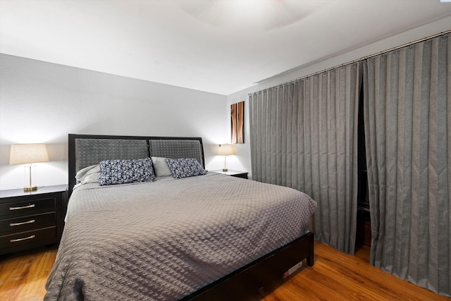 bedroom with light hardwood / wood-style floors