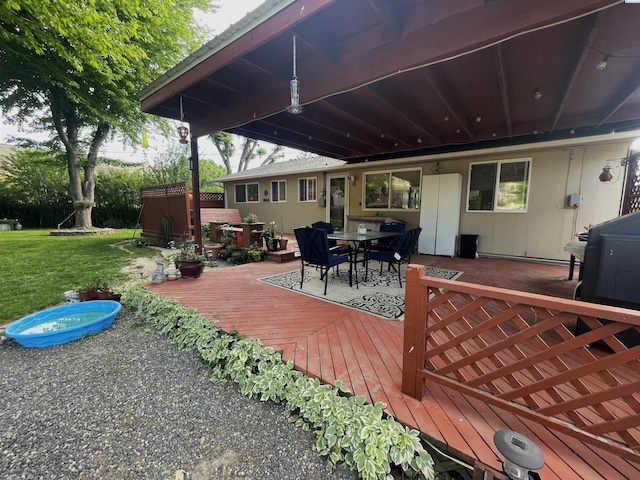 976 Campbell Dr, Prosser, WA 99350 - wooden deck featuring outdoor dining space and a lawn