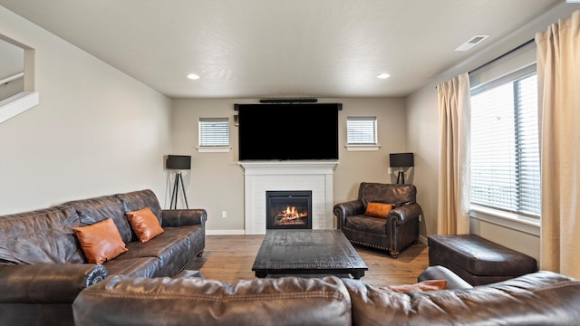 2955 S Kellogg St, Kennewick, WA 99338 - living area with wood finished floors, a glass covered fireplace, and recessed lighting