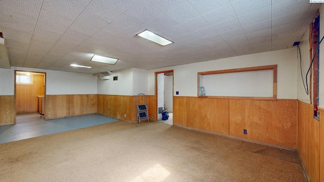 703 W Octave St, Pasco, WA 99301 - carpeted empty room featuring wainscoting and wood walls