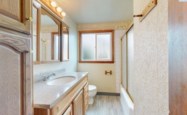 703 W Octave St, Pasco, WA 99301 - full bathroom featuring vanity and enclosed tub / shower combo