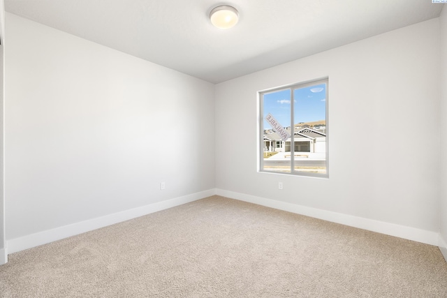 6563 W 30th Pl, Kennewick, WA 99338 - carpeted spare room with baseboards