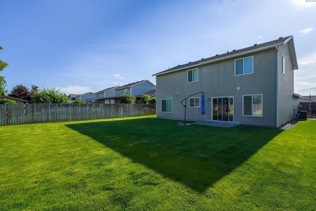 927 N Owen Ave, Pasco, WA 99301 - rear view of property with central AC unit and a patio area