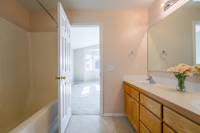 927 N Owen Ave, Pasco, WA 99301 - full bathroom featuring double vanity, bathing tub / shower combination, and baseboards