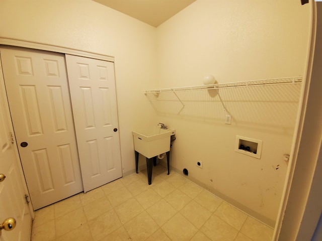 5416 Mariner Ln, Pasco, WA 99301 - laundry area with electric dryer hookup, washer hookup, and light tile patterned floors