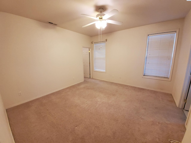 5416 Mariner Ln, Pasco, WA 99301 - empty room with light carpet and a ceiling fan