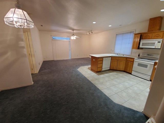 5416 Mariner Ln, Pasco, WA 99301 - kitchen with white appliances, a ceiling fan, light carpet, open floor plan, and recessed lighting