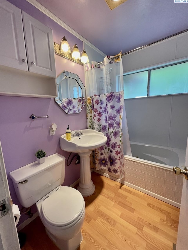 2402 Dover St, Richland, WA 99352 - full bath with toilet, tiled shower / bath combo, wood finished floors, and crown molding