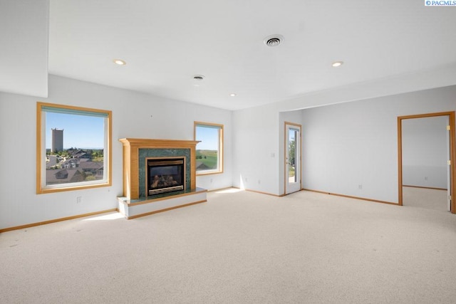 1815 NW Nicole Ct, Pullman, WA 99163 - unfurnished living room with baseboards, light colored carpet, a premium fireplace, and recessed lighting