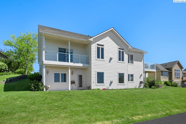 1815 NW Nicole Ct, Pullman, WA 99163 - rear view of house with a balcony and a yard