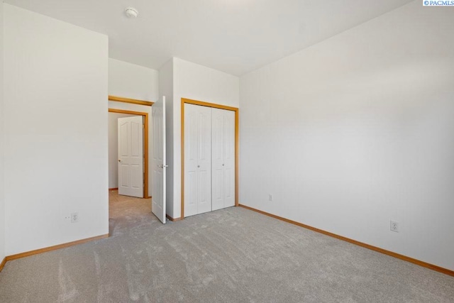1815 NW Nicole Ct, Pullman, WA 99163 - unfurnished bedroom featuring baseboards, carpet floors, and a closet
