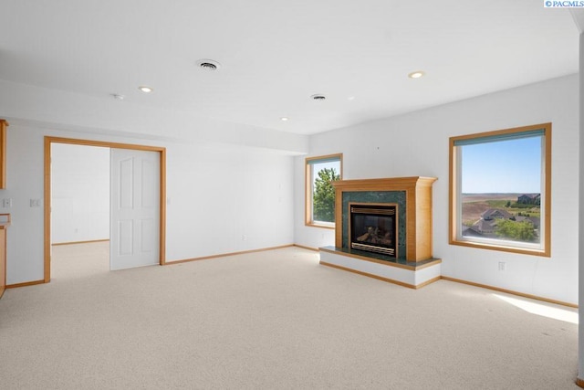 1815 NW Nicole Ct, Pullman, WA 99163 - unfurnished living room with baseboards, a high end fireplace, carpet flooring, and recessed lighting