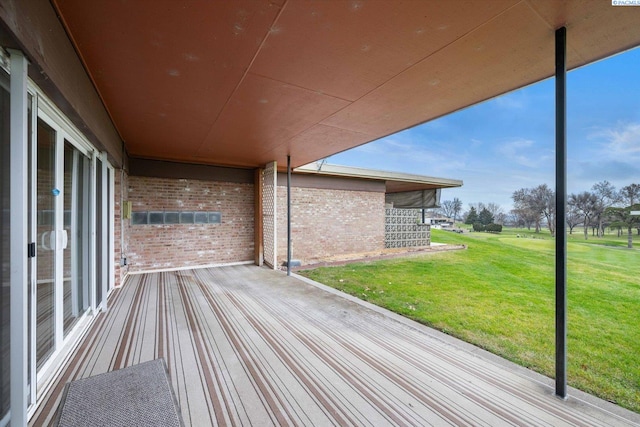 wooden deck with a yard