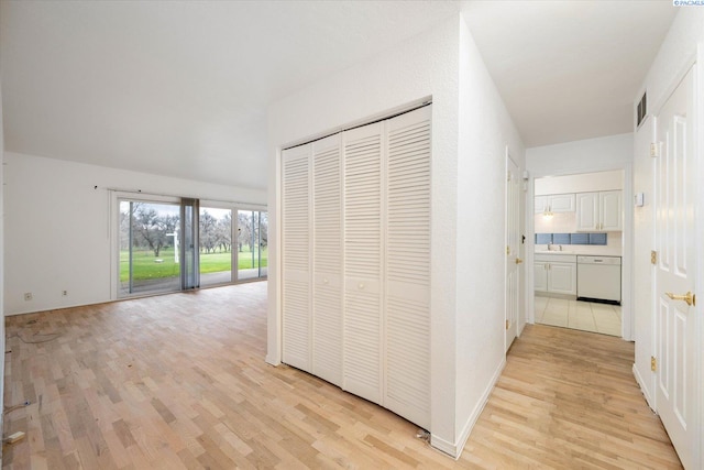 hall featuring light wood-type flooring