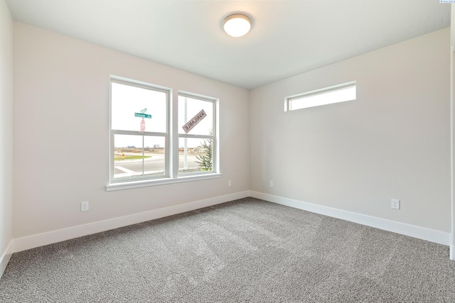 10402 Kokanee Dr, Pasco, WA 99301 - empty room with baseboards and carpet floors