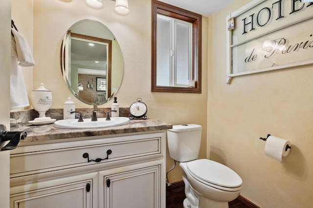 4834 W Robin Ct, West Richland, WA 99353 - half bath featuring vanity and toilet